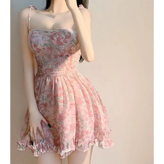 Sommarminiklänning - blommigt tryck i tubmodell med hög midja och flödeskjol