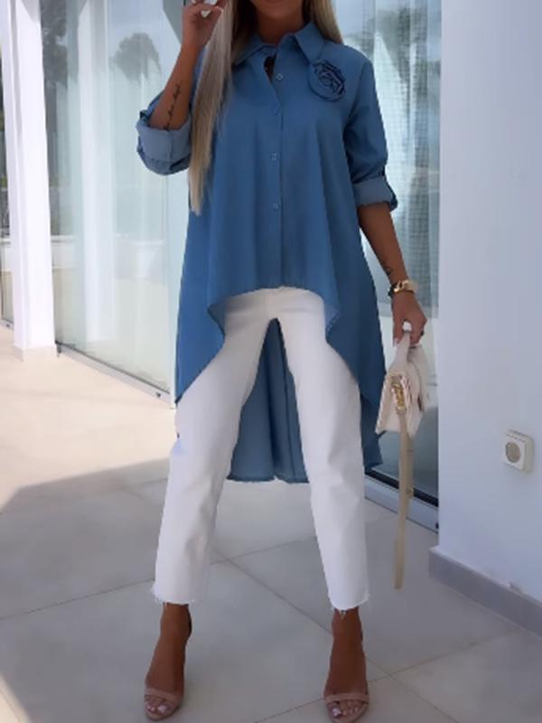 Långärmad asymmetrisk blus i enfärgad design för kvinnor