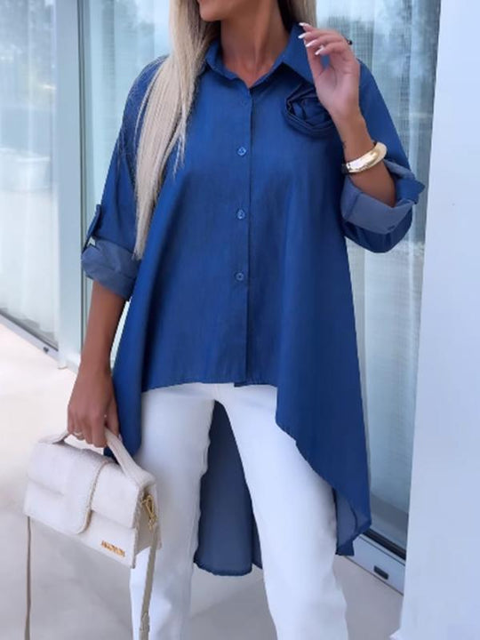 Långärmad asymmetrisk blus i enfärgad design för kvinnor